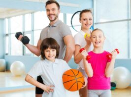 Depositphotos 68200921 Stock Photo Family Holding Different Sports Equipment