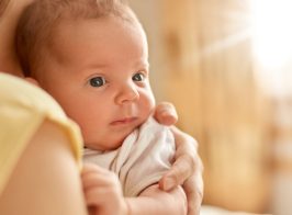 Newborn Baby Her Mothers Arms Looking Away Studying Outward Things Faceless Mum With Child Indoor Cute Infant With Mum E1622184122578